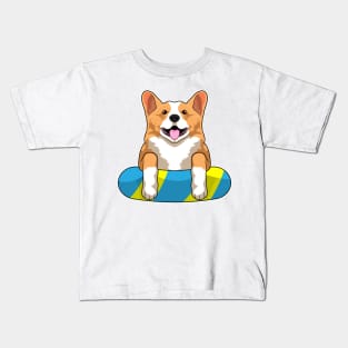 Welsh Corgi at Swimming with Swimming board Kids T-Shirt